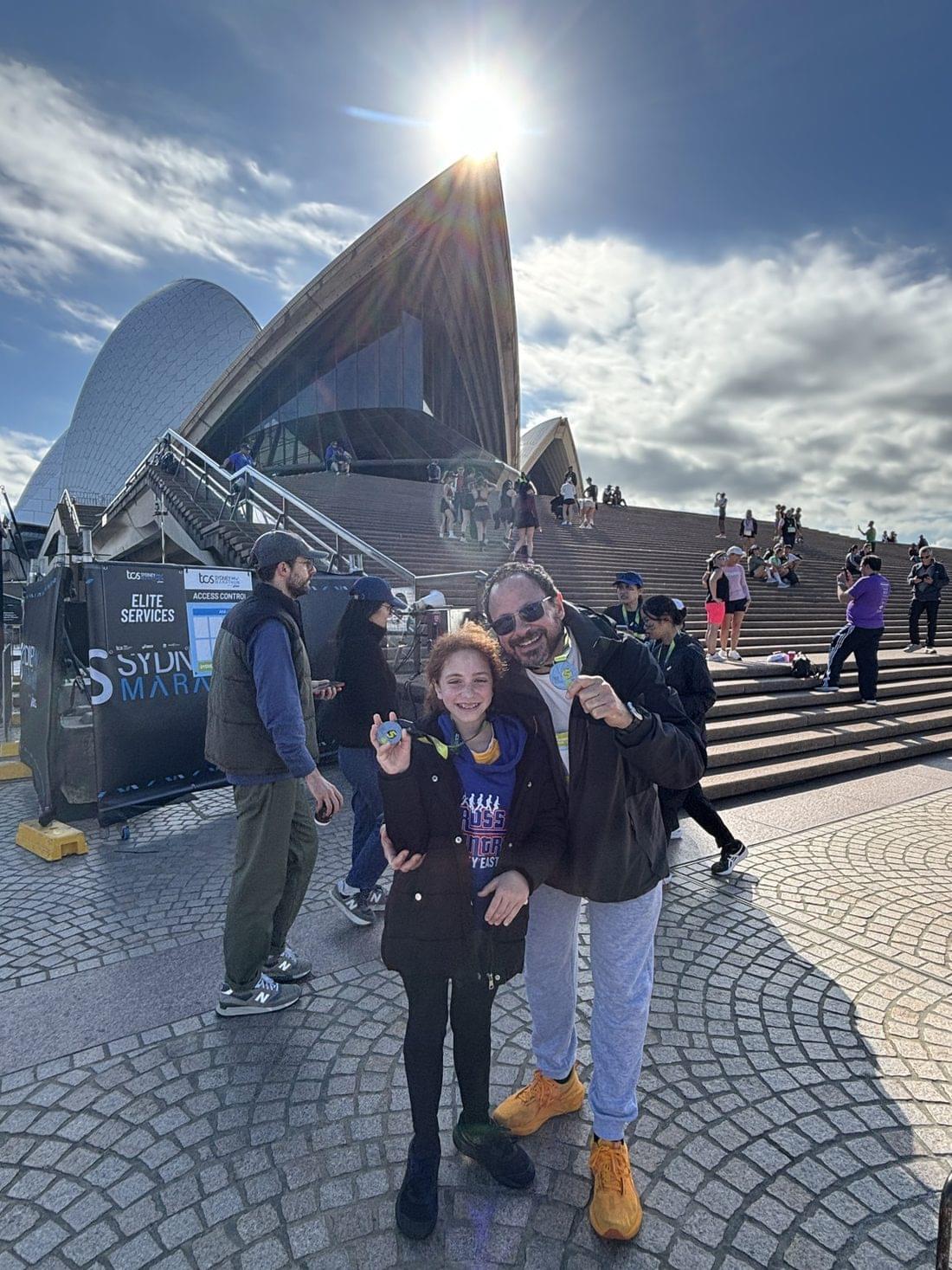 Finishers with their medals at the Sydney Opera House